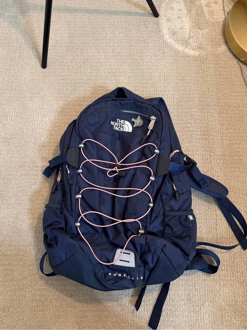 The North Face Navy Backpack with Pink Bungee Cord